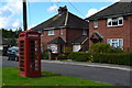 Telephone box on the green in Coles Mead