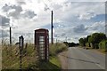 Isolated phone box near Greatham