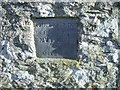 A memorial stone built into the wall, Mathry