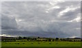 SU1168 : Brooding sky over The Sanctuary, near Avebury, Wiltshire by Edmund Shaw