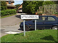 TM1763 : Little London Hill sign by Geographer