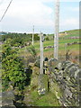 Stile and signpost on Sowerby bridge FP93 at Hob Lane, Norland