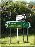 TM1165 : Roadsigns on the A140 Ipswich Road by Geographer