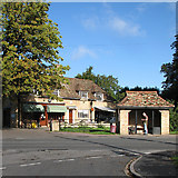 TL4055 : Barton: shoe shop, post office and bus shelter by John Sutton