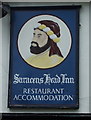 Sign for the Saracens Head Inn