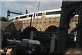 View of a train passing over the viaduct on Stoney Street