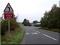 Approaching a bend in the road towards Todhills