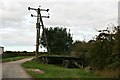 Power lines and farm trailer, Chapel Field Road, Goxhill