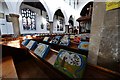 Diss: St. Mary the Virgin Church: The nave with its impressive display of kneelers