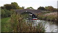 Narrowboat approaching Terrace Bridge