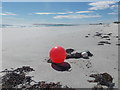 HY7039 : Sanday: a buoy on the beach by Chris Downer