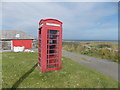 HY5220 : Shapinsay: red phone box on the B9058 by Chris Downer