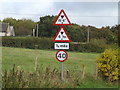 Roadsigns on the B1121 Main Road