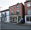 Struggling with a heavy load in Severn Street, Welshpool