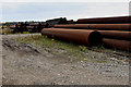 SE4275 : Steel Pipes on the Dalton Airfield Industrial Estate by Chris Heaton