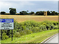 TG2815 : Crop Harvest between Wroxham and Rackheath by David Dixon