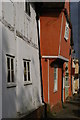 TL9149 : Lavenham: multi-coloured houses on the north side of Water Street by Christopher Hilton