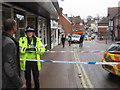 A Policewoman at the scene of Crime in Tring High Street