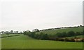 Undulating pasture land on the south side of Magheraconluce Road