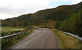 NN0168 : Cattle Grid on the A861 by Peter Bond