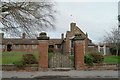 SY9287 : Almshouse gate by Bob Harvey