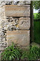 Benchmark on barn at Oxenclose Farm