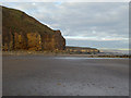 Cliffs and beach to the south of Limekiln Gill