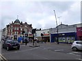 TQ2583 : Kilburn High Road station and adjacent businesses by David Smith