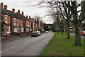 Innage Road south towards a viaduct arch, Shifnal