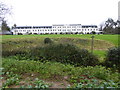 The Arundel Wing of Tortington Manor seen from the footpath