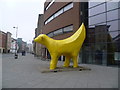 The yellow Superlambanana outside Liverpool John Moores University