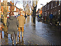 Watching the floodwater level in Broad Street