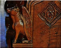 TM1058 : Earl Stonham, St. Mary's Church: Winged bull bench end from the choir stalls by Michael Garlick