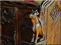 TM1058 : Earl Stonham, St. Mary's Church: Winged bull bench end from the choir stalls by Michael Garlick