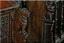 TM1058 : Earl Stonham, St. Mary's Church: Lion and bagpiper bench ends from the choir stalls by Michael Garlick