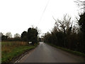 TL3656 : Entering Toft on Hardwick Road by Geographer