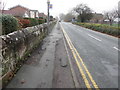 Eaton Road, and a bench mark in front of #31