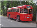 Old red bus on Redhill Road, Cobham