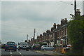 TM1033 : Houses on the A137 by N Chadwick