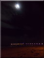 SZ0890 : Bournemouth: Christmas full moon over the pier by Chris Downer