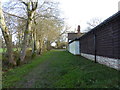 Bridleway passes dwelling on way to Waterlands Lane