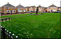 Benches in a grassy rectangle, Foxglove Meadows, Bettws, Newport