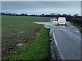 TR2243 : Flooded road by John Baker