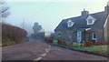 Cottage by a lane junction