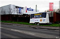 ST3486 : Wessex Garages mobile advertising board in Newport Retail Park by Jaggery