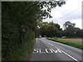 Approaching a sharp bend in Main Road, Middlewood Green