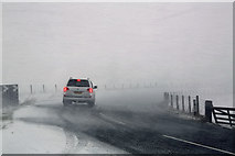 NT4827 : Blizzard conditions on the A699 near Selkirk by Walter Baxter