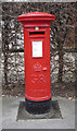 TA1664 : George V postbox outside South Cliff Caravan Park by JThomas