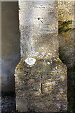 SU3899 : Benchmark on St Mary's Church tower buttress by Roger Templeman