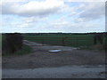 TA1455 : Gated farm track near Dringhoe Manor Farm by JThomas